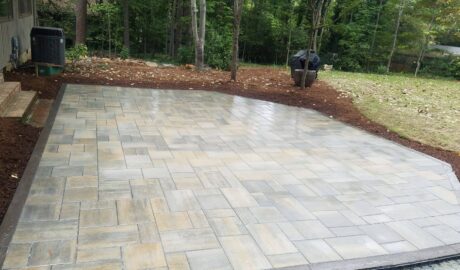 outdoor patio project by GrassMaster with stone pavers