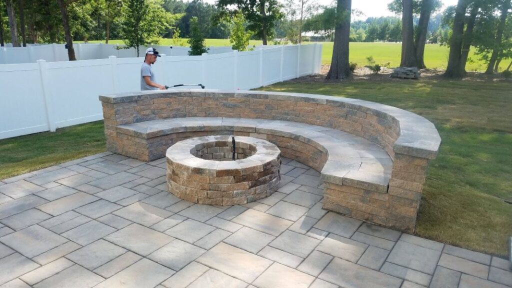Hardscape outdoor patio with fireplace and sitting area